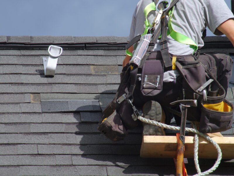 roofer construction roof repair rope security worker